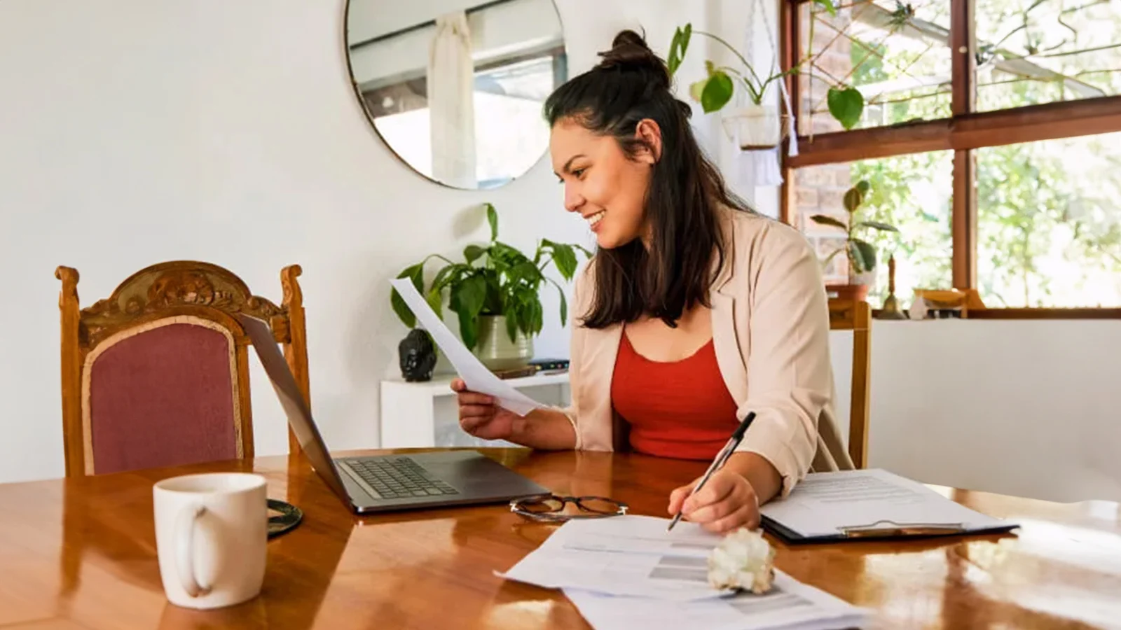 Young woman using her laptop