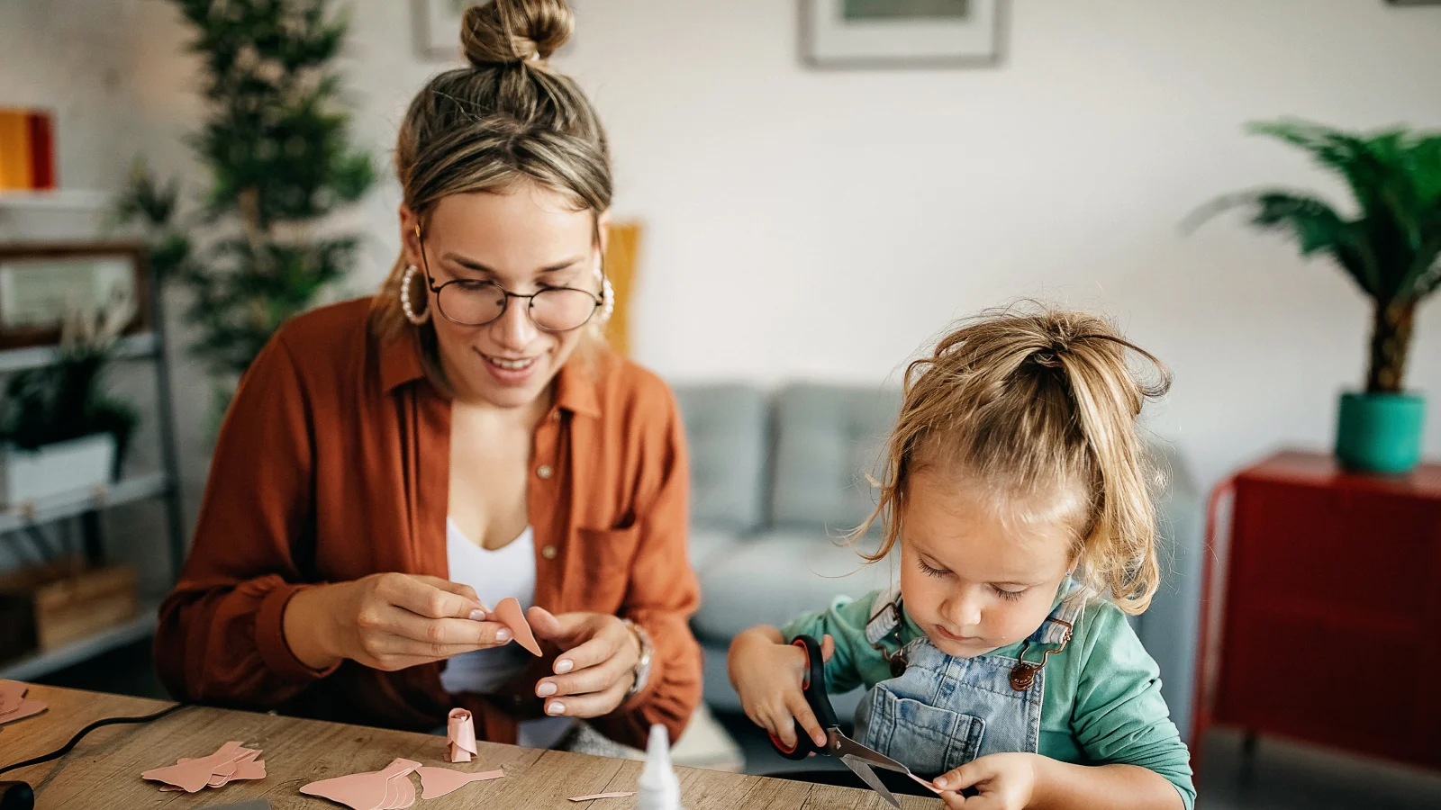 mom-and-young-daughter-making-crafts