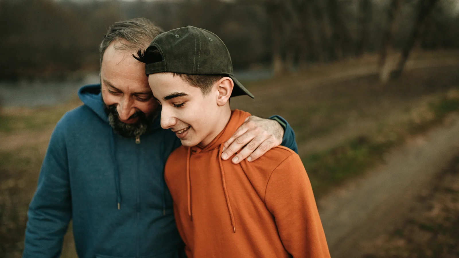 Critical illness insurance - Father and son heartfelt walk