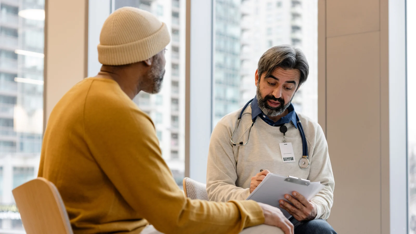 Cancer support services - Doctor speaking to his patient