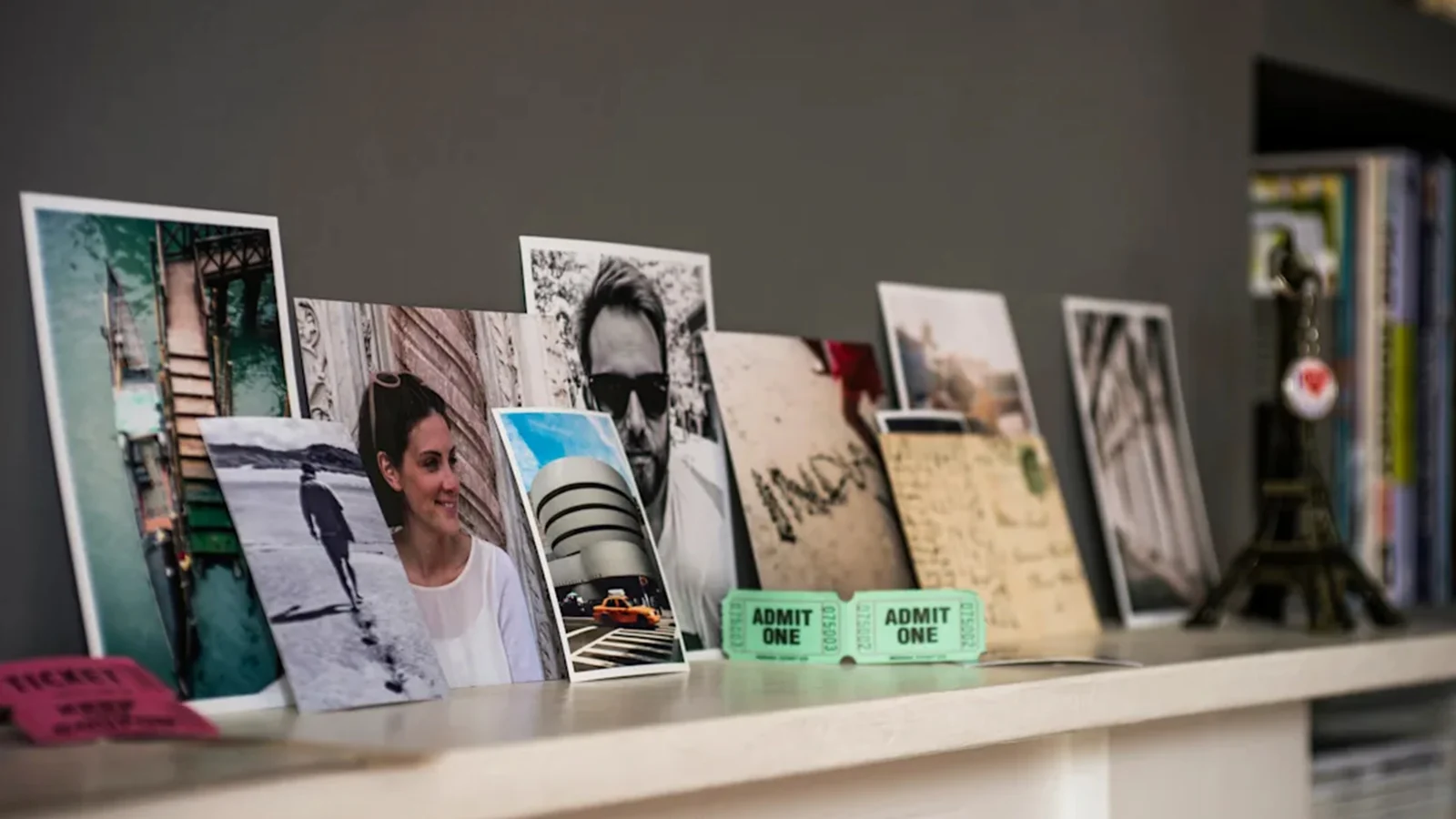 Living room mantelpiece with travel souvenirs and photographs