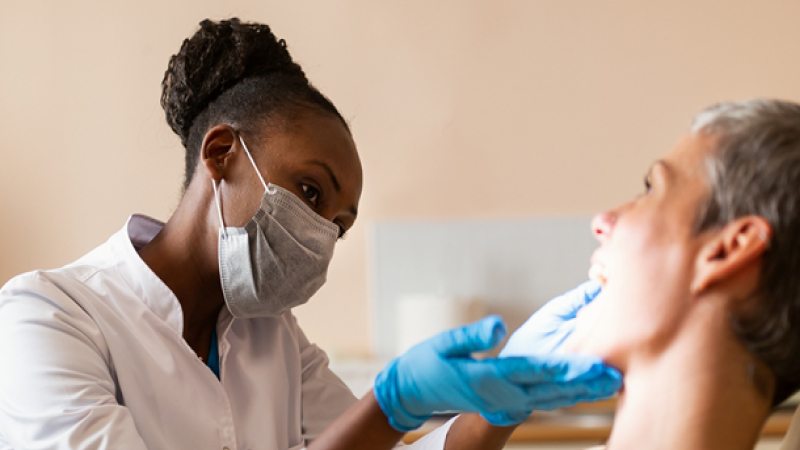 Dentist conducting an examination.