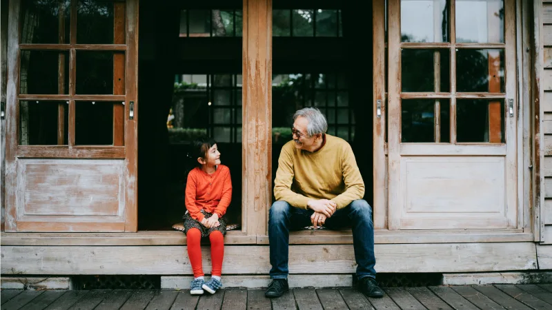 Wondering if an annuity is right for you? The top 5 things to know - Grandfather and granddaughter spending time together