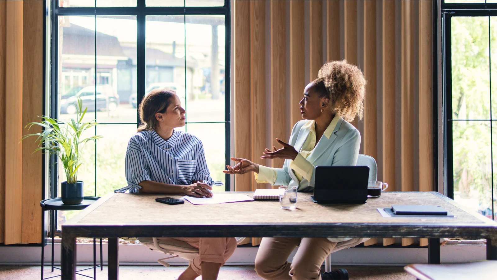 Two business women having a conversation