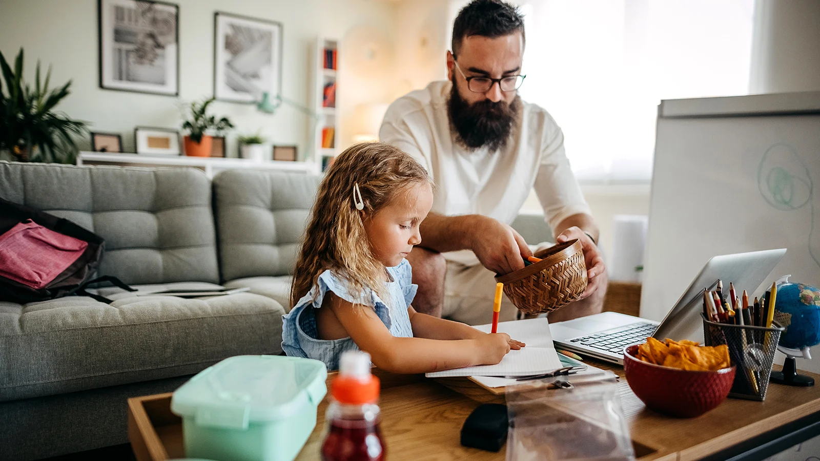 Dean & Draper Case Study - Daughter drawing with her father