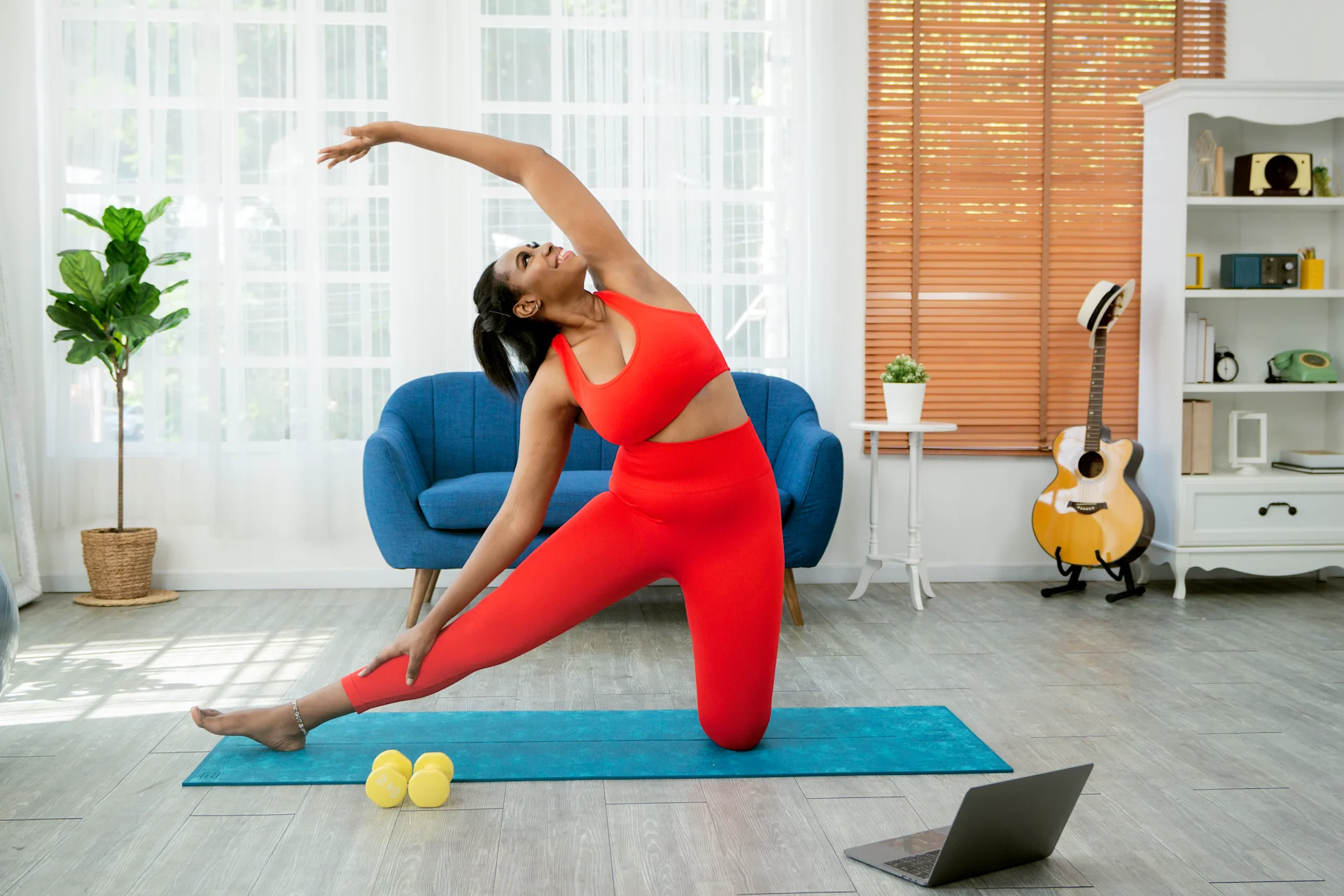 Woman practicing yoga at home.