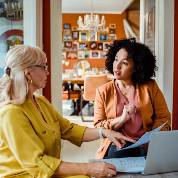 Two women in a discussion.