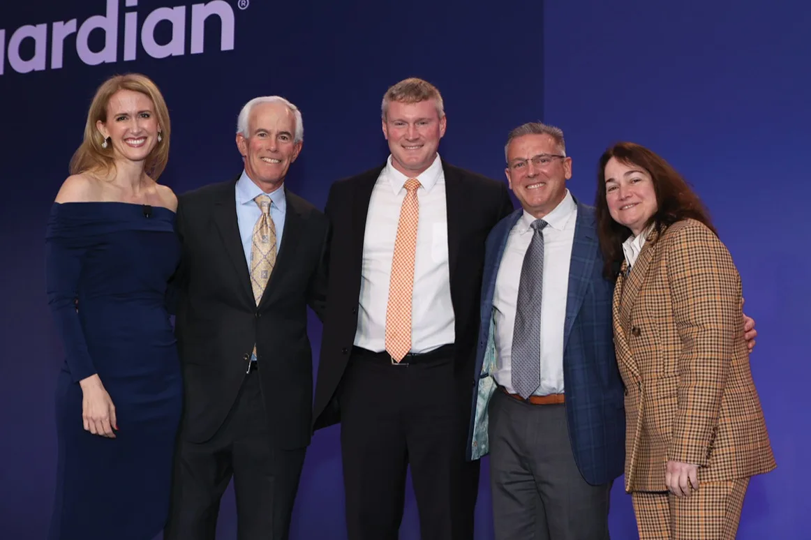 Boston, led by Seth Medalie, John Brady, and Tom Harmon, joined by Meg Vecchi on the left and Leyla Lesina on the right