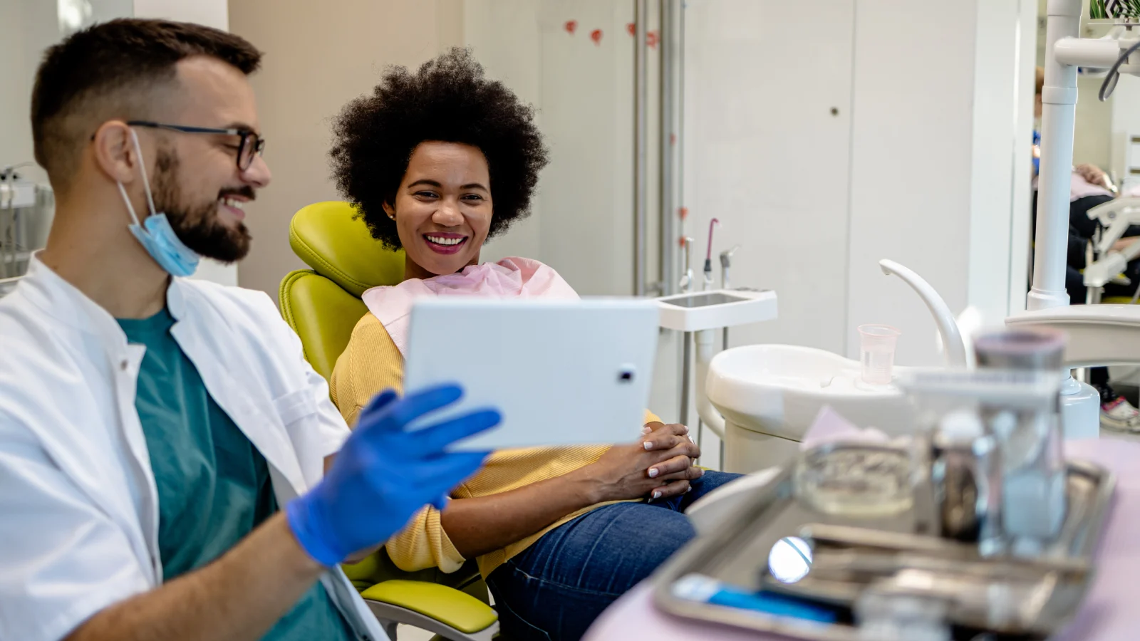 Dentist using digital technology for patient care