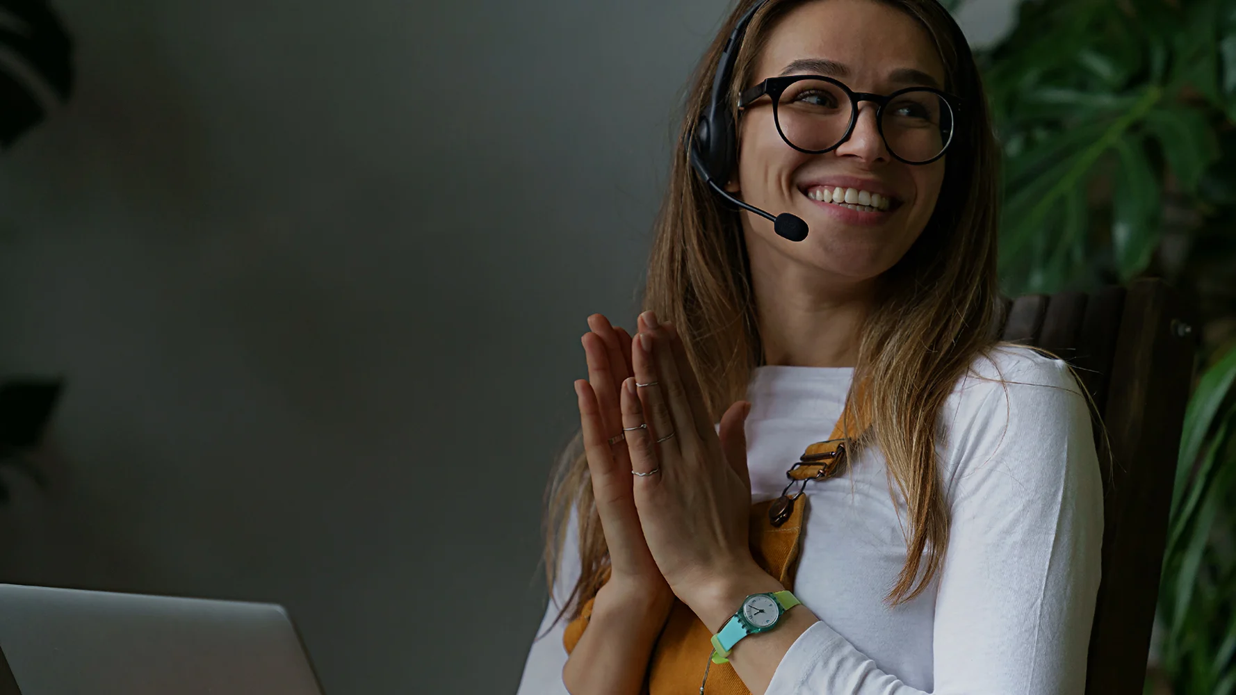 Woman smiling while using headphones
