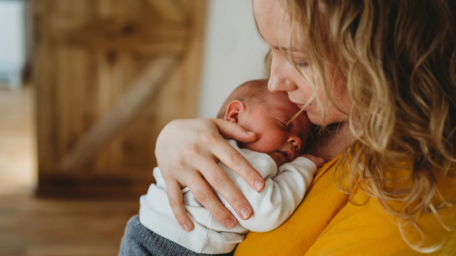 Mother holding her newborn baby