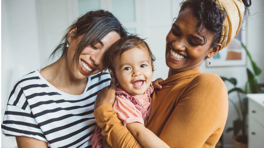 Find out more about the value of holistic financial protection - Mothers and toddler smiling