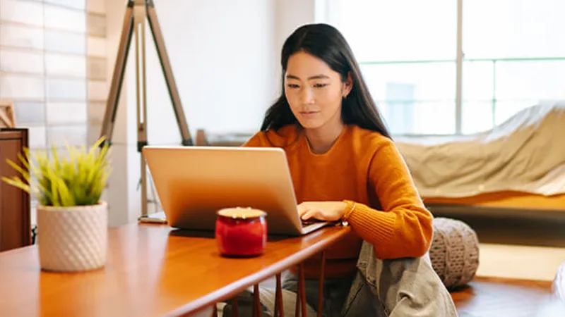 Safeguard your data - Young woman on her laptop