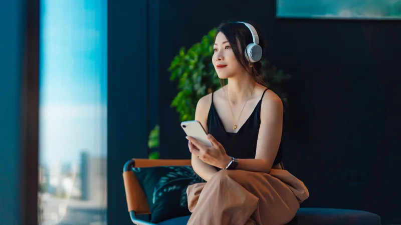 Professional development - Woman with headphones on learning about professional development