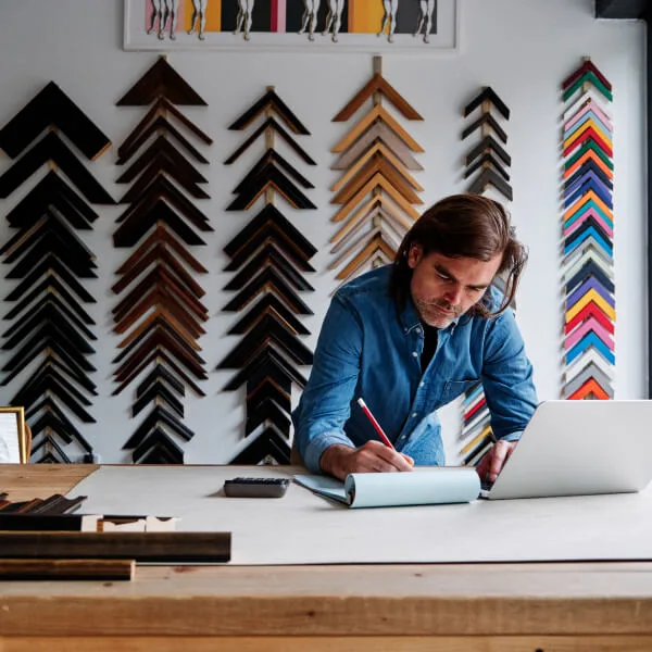 Small business owner exploring workplace benefits options.