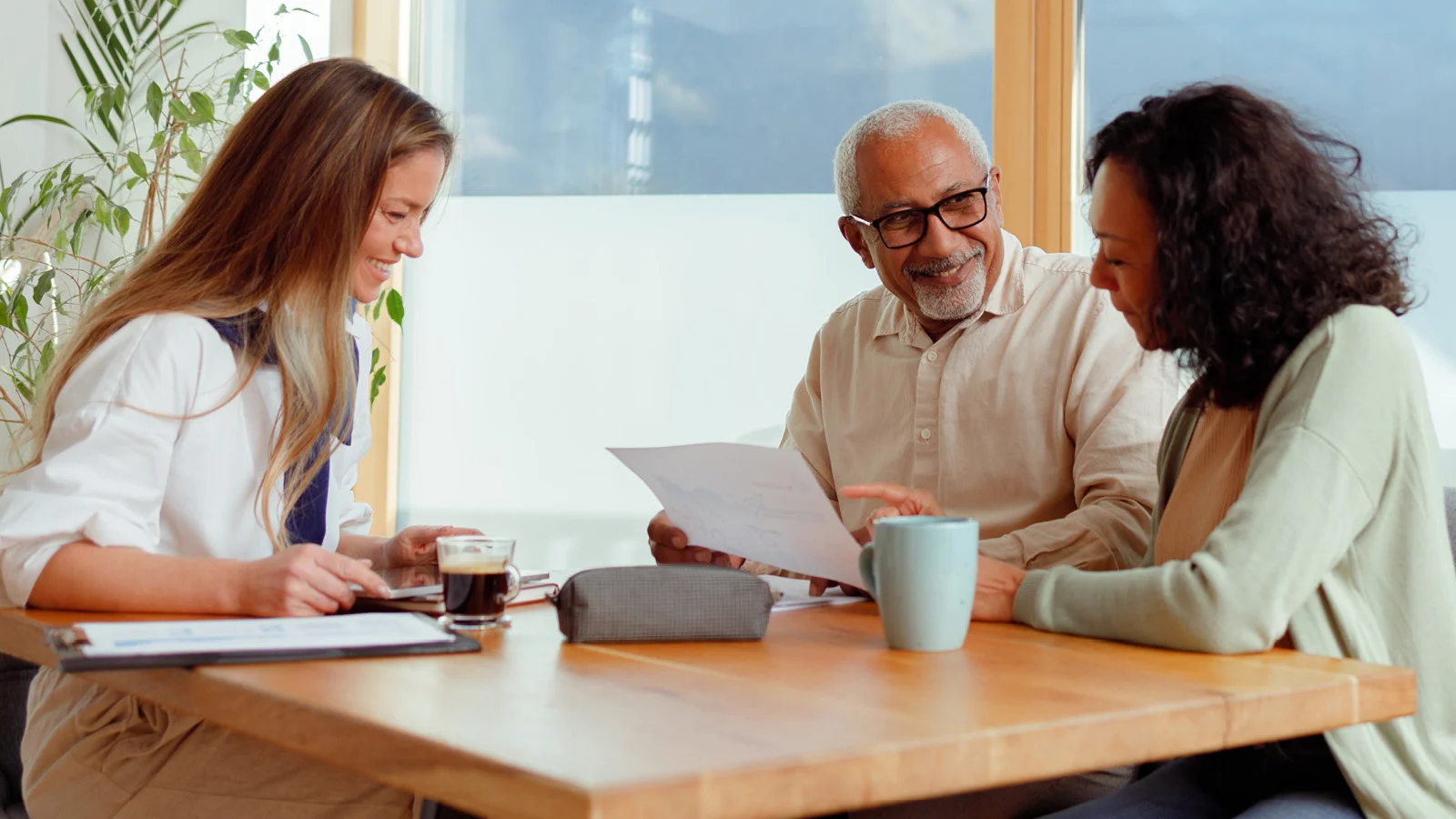 Small business owner speaks to financial advisor