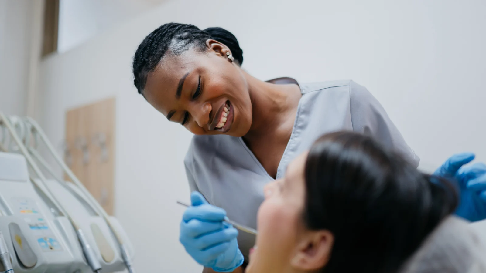 Female dentist checking a patients teeth