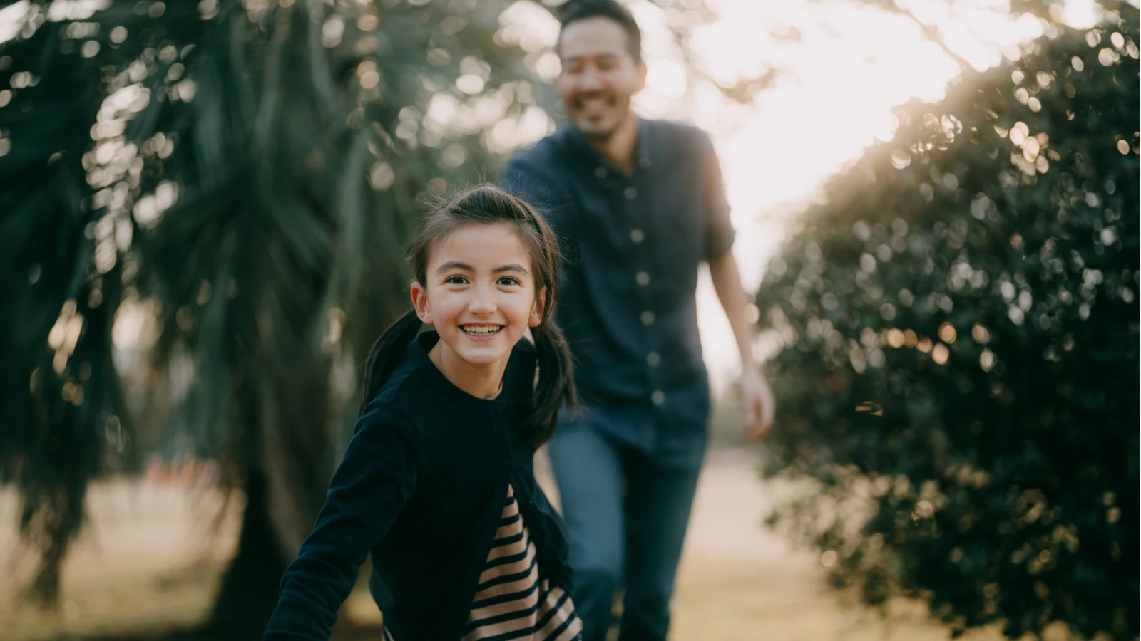 Opens up a future filled with possibilities - Girl and dad running outside