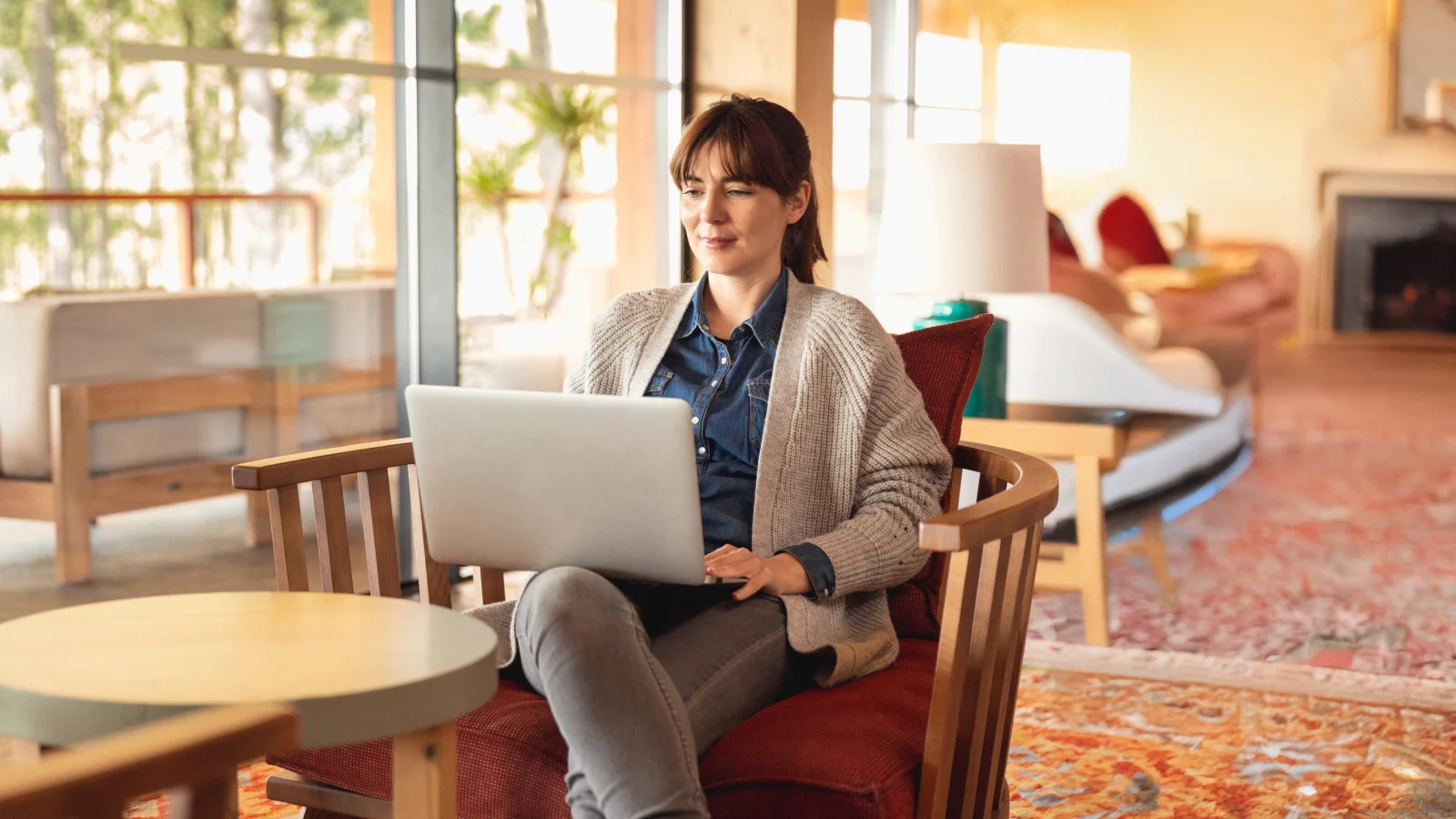 Woman working on a computer at an office