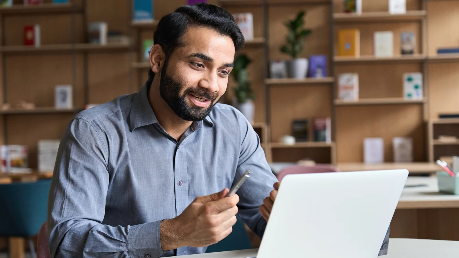 Man engaging with a webinar.