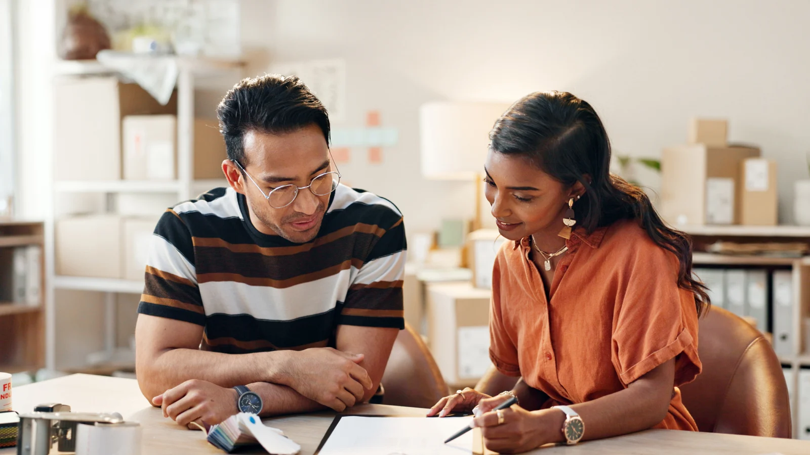 Woman training an employee with logistics