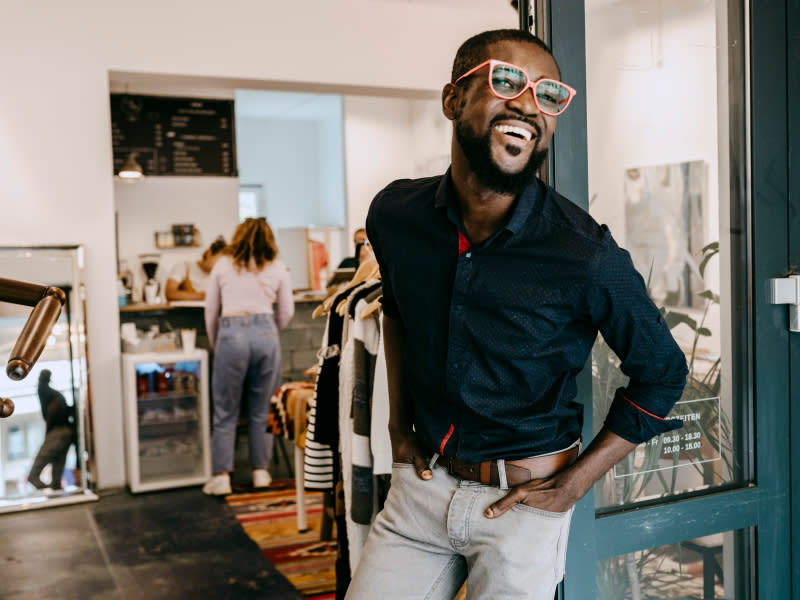 Man smiling in shop