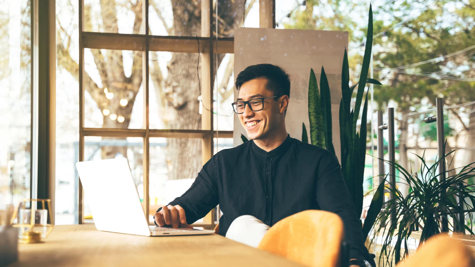 Man engaging with an expert via video call. Man engaging with an expert via video call.