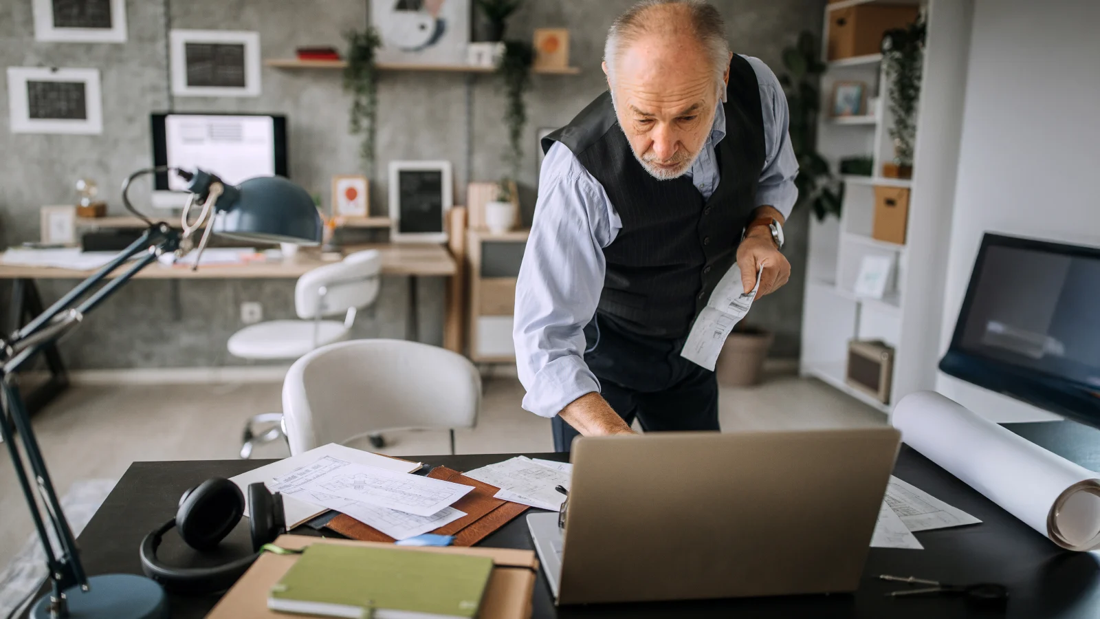 Senior architect at his office