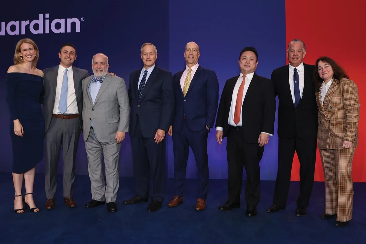 National Financial Network, led by Mike Maresca, Gary DeStefano, Steve Earhart, Rob Votruba, Derek Chan, and Tony Mazzei, joined by Meg Vecchi on the left and Leyla Lesina on the right