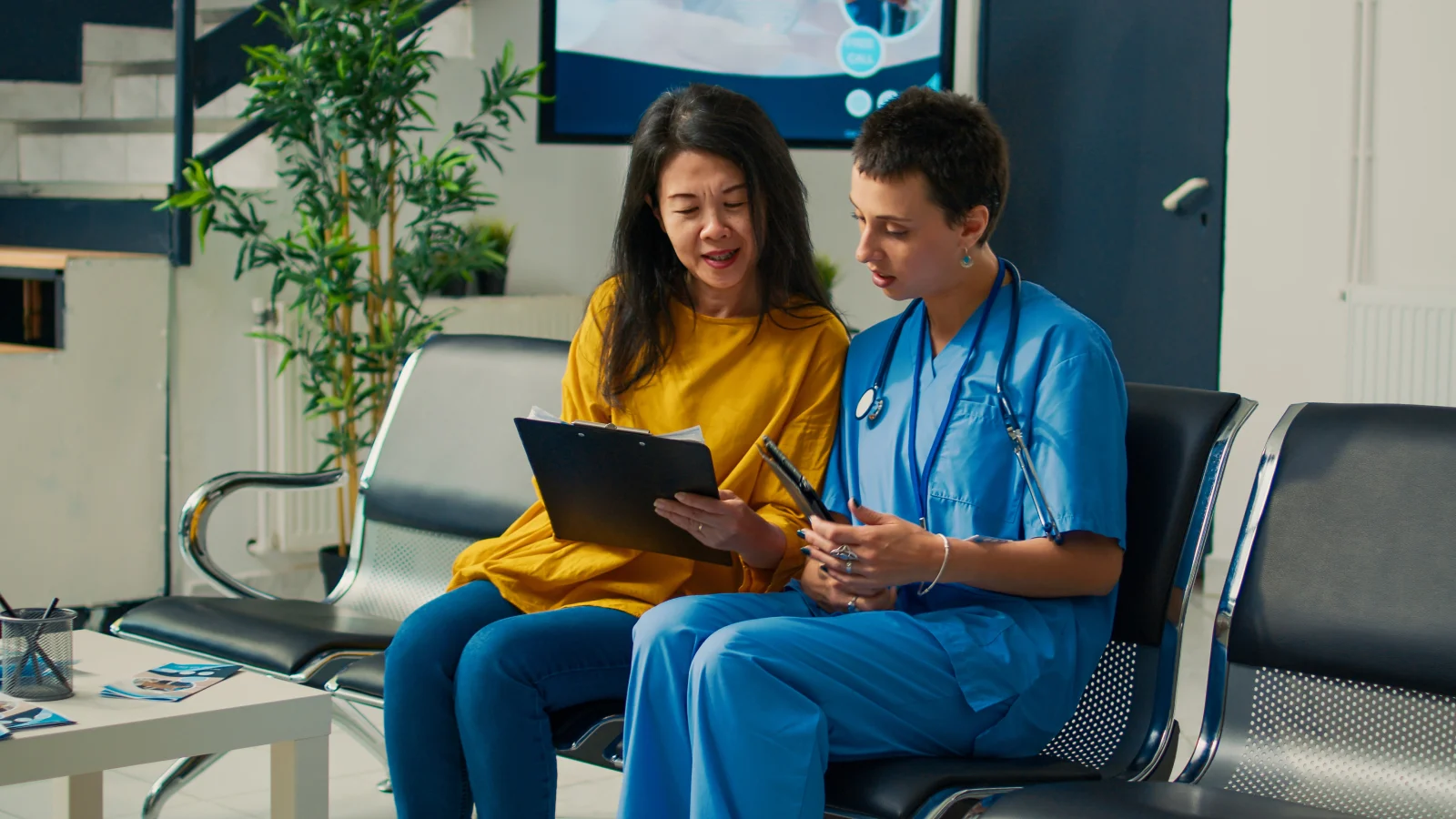 Woman consulting with a nurse.