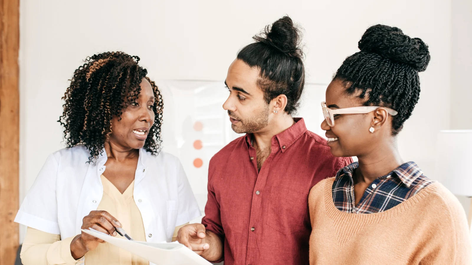 Maximize productivity and efficiency  - A couple having a consultation with a doctor.