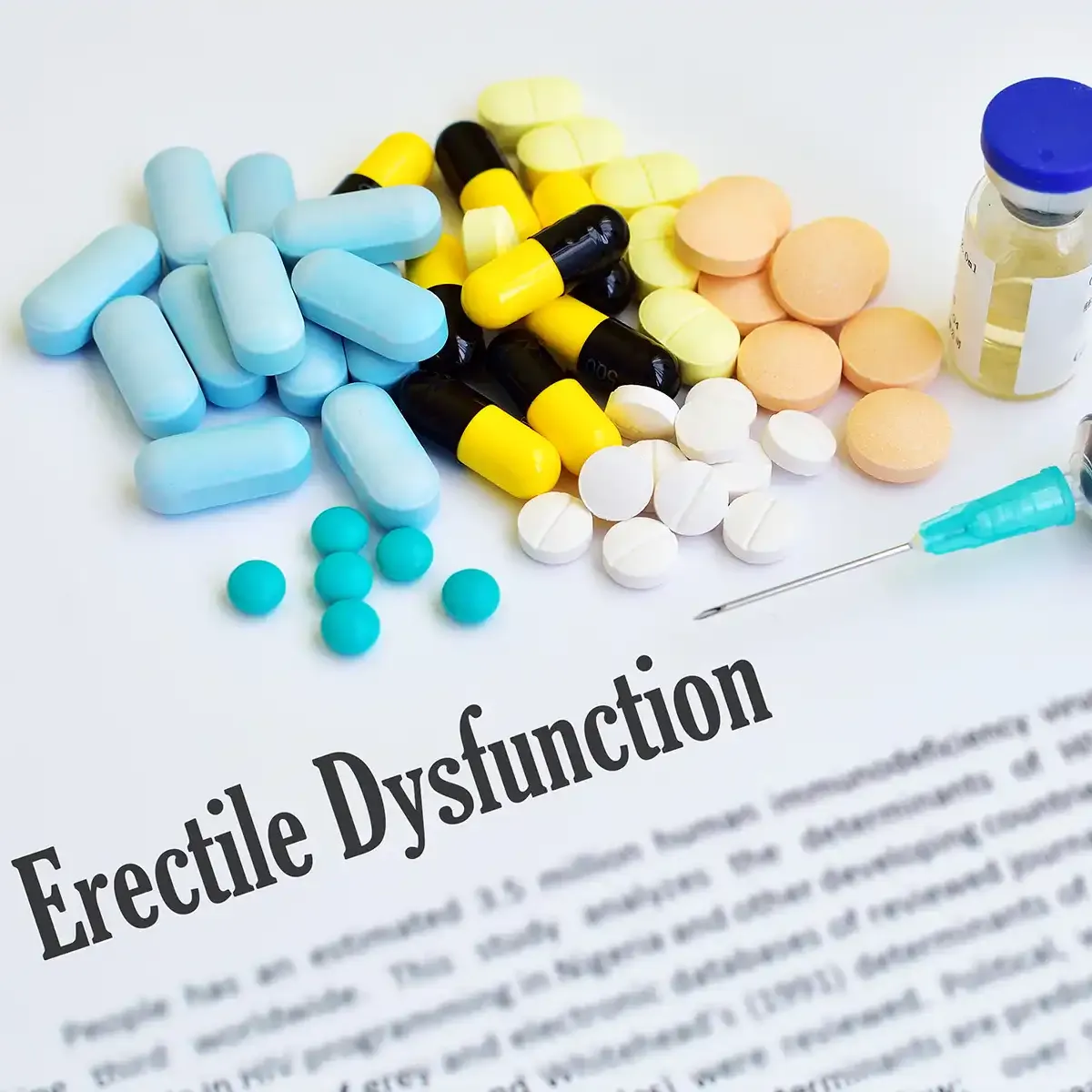 Various ED treatments poured over an article about erectile dysfunction.