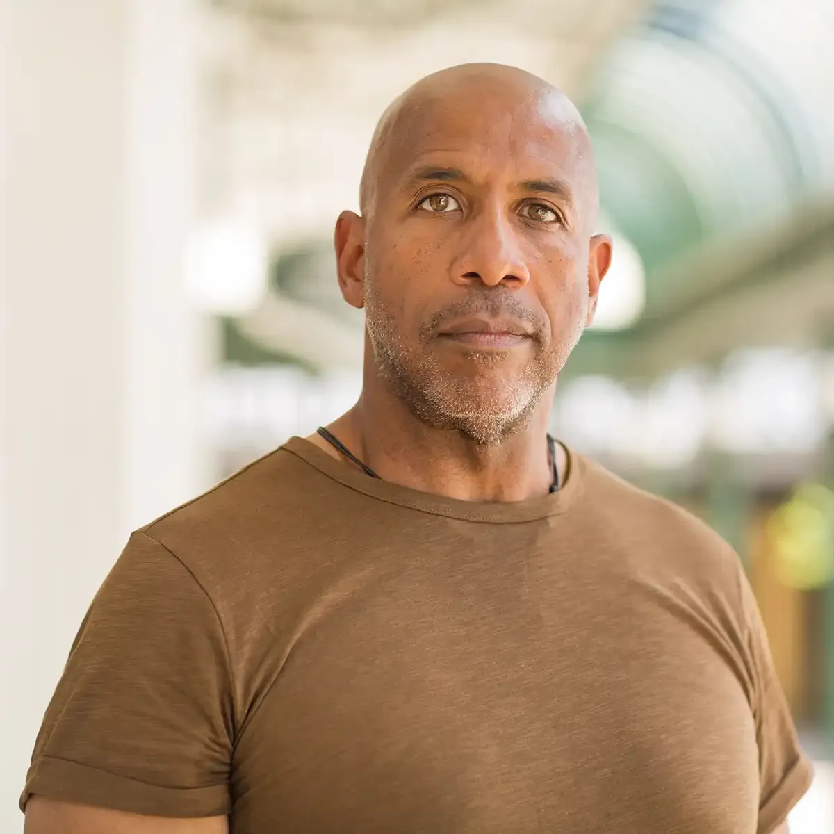 Man in his 40s looking to camera