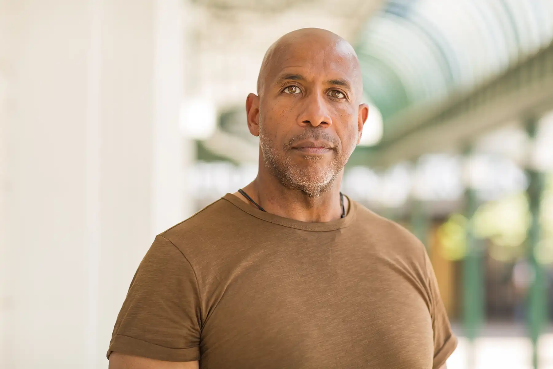 Man in his 40s looking to camera