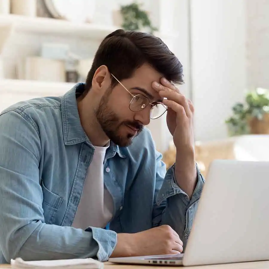 a man on a laptop
