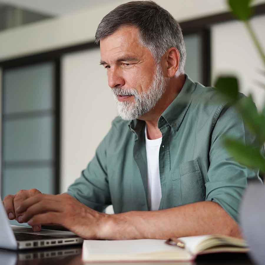 A man on a computer