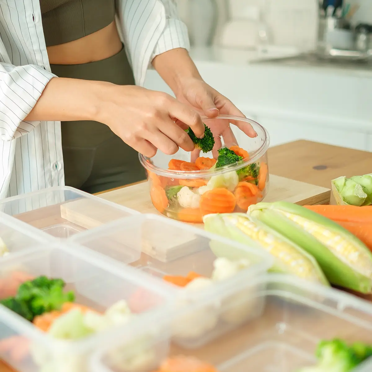 A woman preparing a healthy meal.