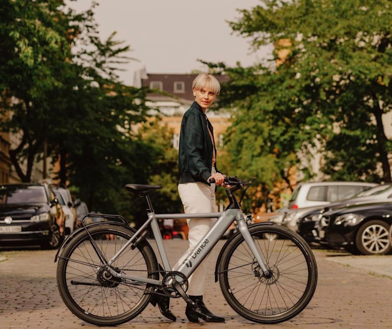 Lara on bike in Pberg