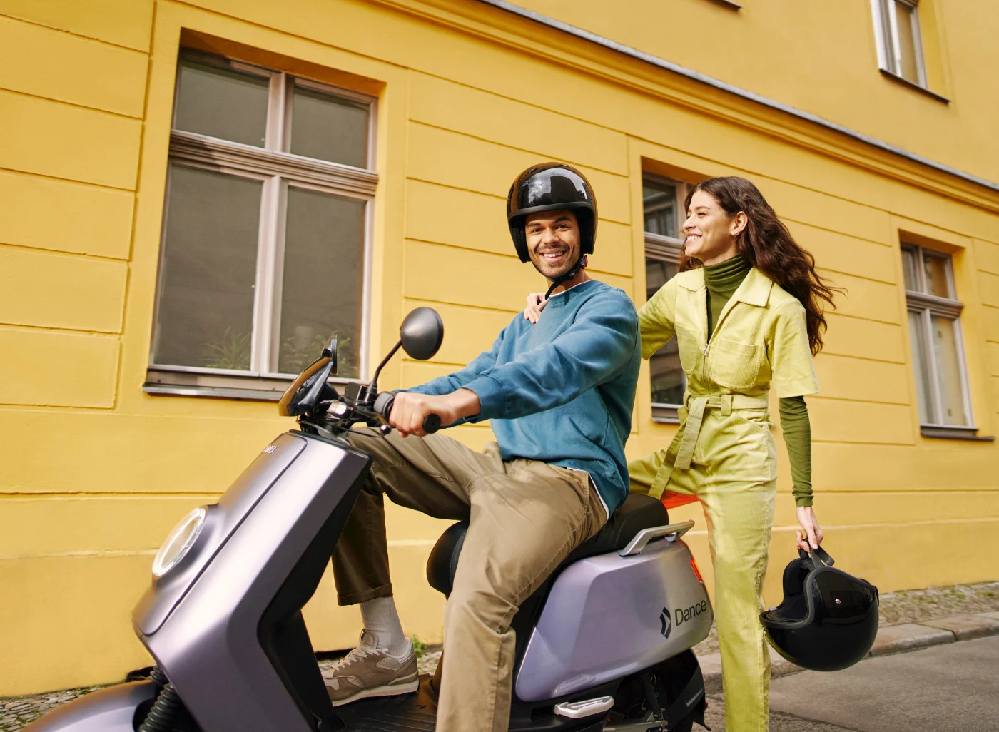 Guy and girl with moped