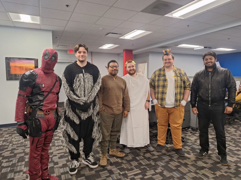 Team members showing creativity and personality during our Halloween costume contest.