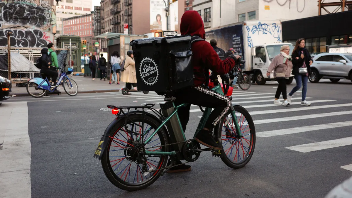 NYC Delivery Riders Feel Safer Thanks to Minimum Pay Law