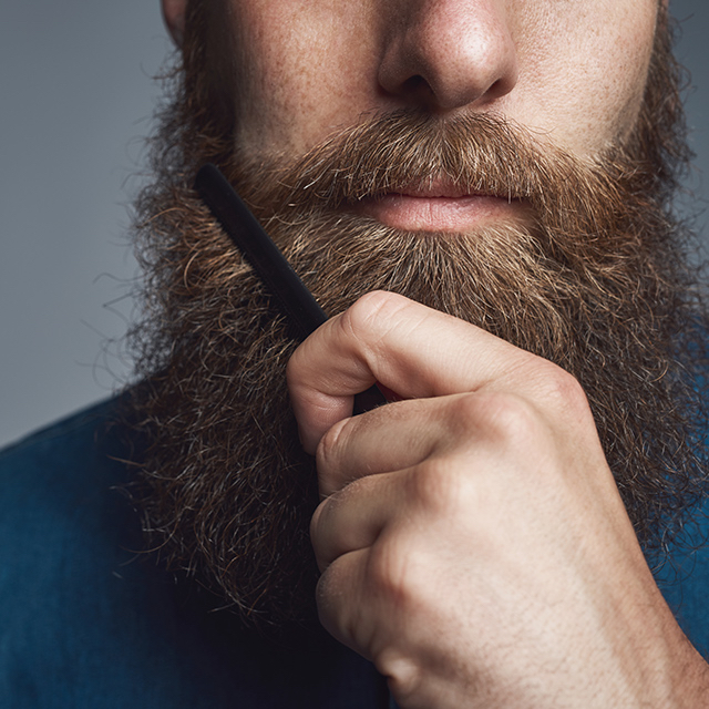 A beard brush may encourage growth