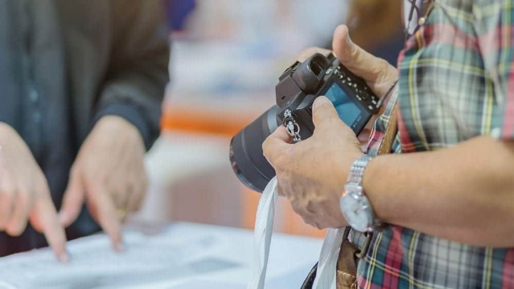 people testing a camera