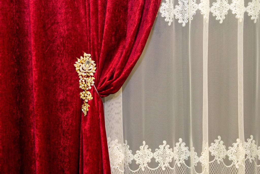 Red velvet curtains with classic style.