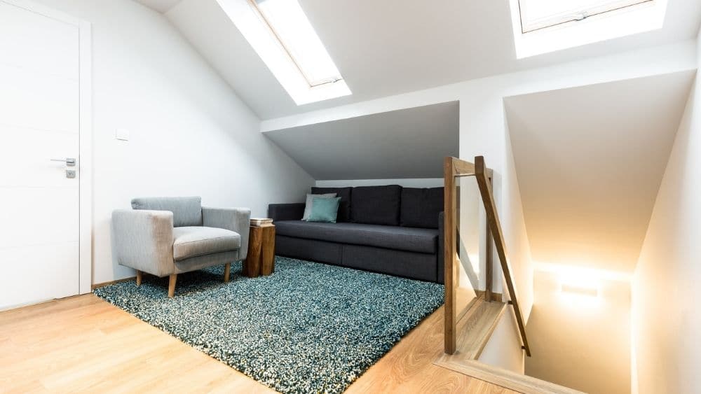 Partially-finished attic with a lounge area.