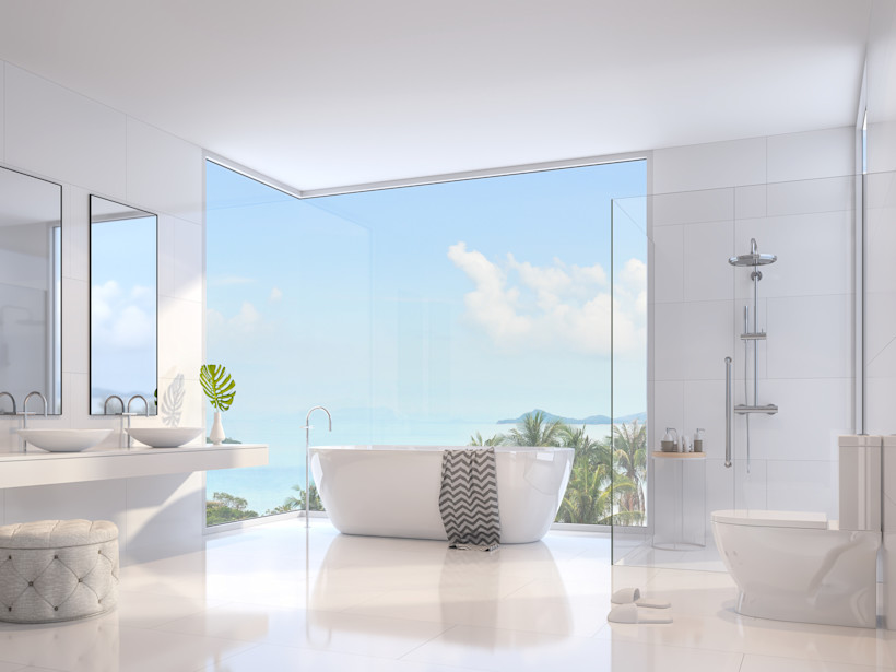 Wet room with large picture window with soaker tub placed in front of the view. 