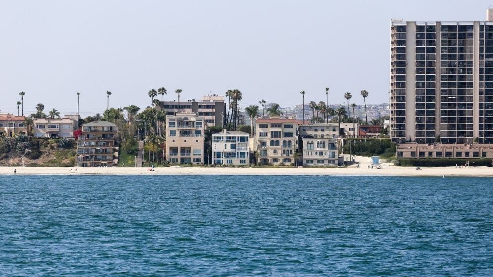 View from the water of condos and apartment buildings along the beach.