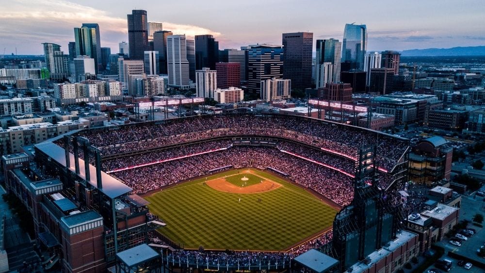 View from above of Coors Field, stands filled with fans. Coors Field is home to the Colorado Rockies MLB team.