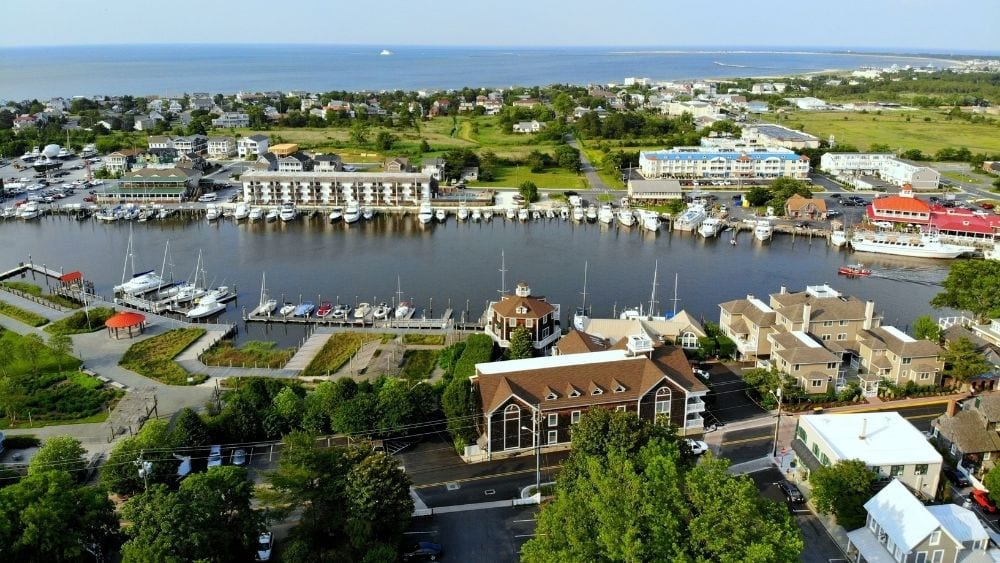 Small bay in a neighborhood with large houses and private boats.