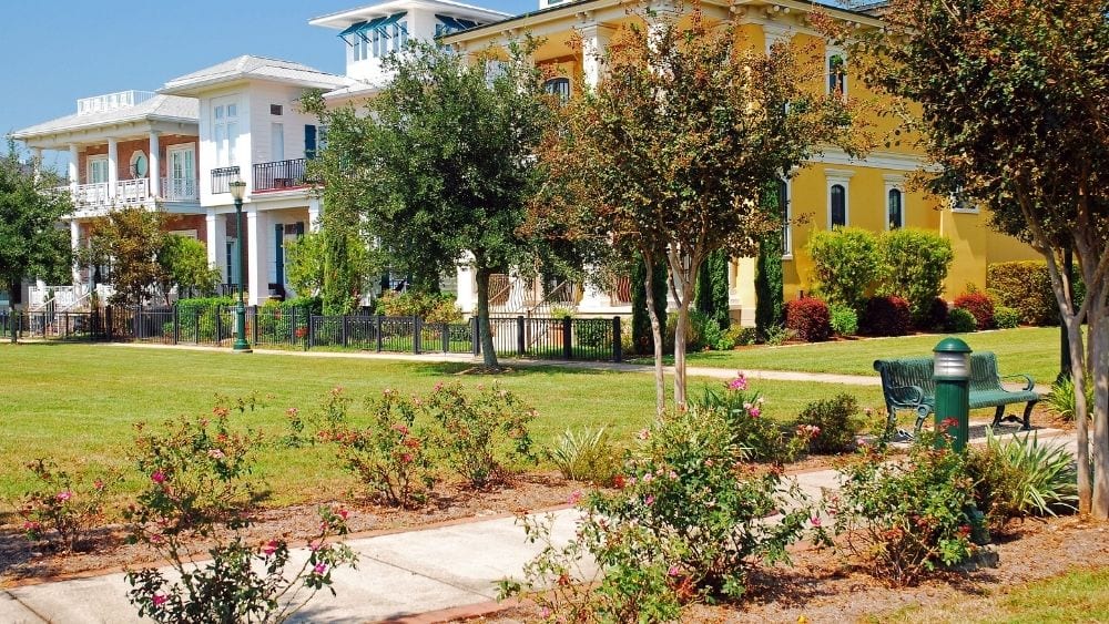 Historical beach style homes with well-maintained landscaping.